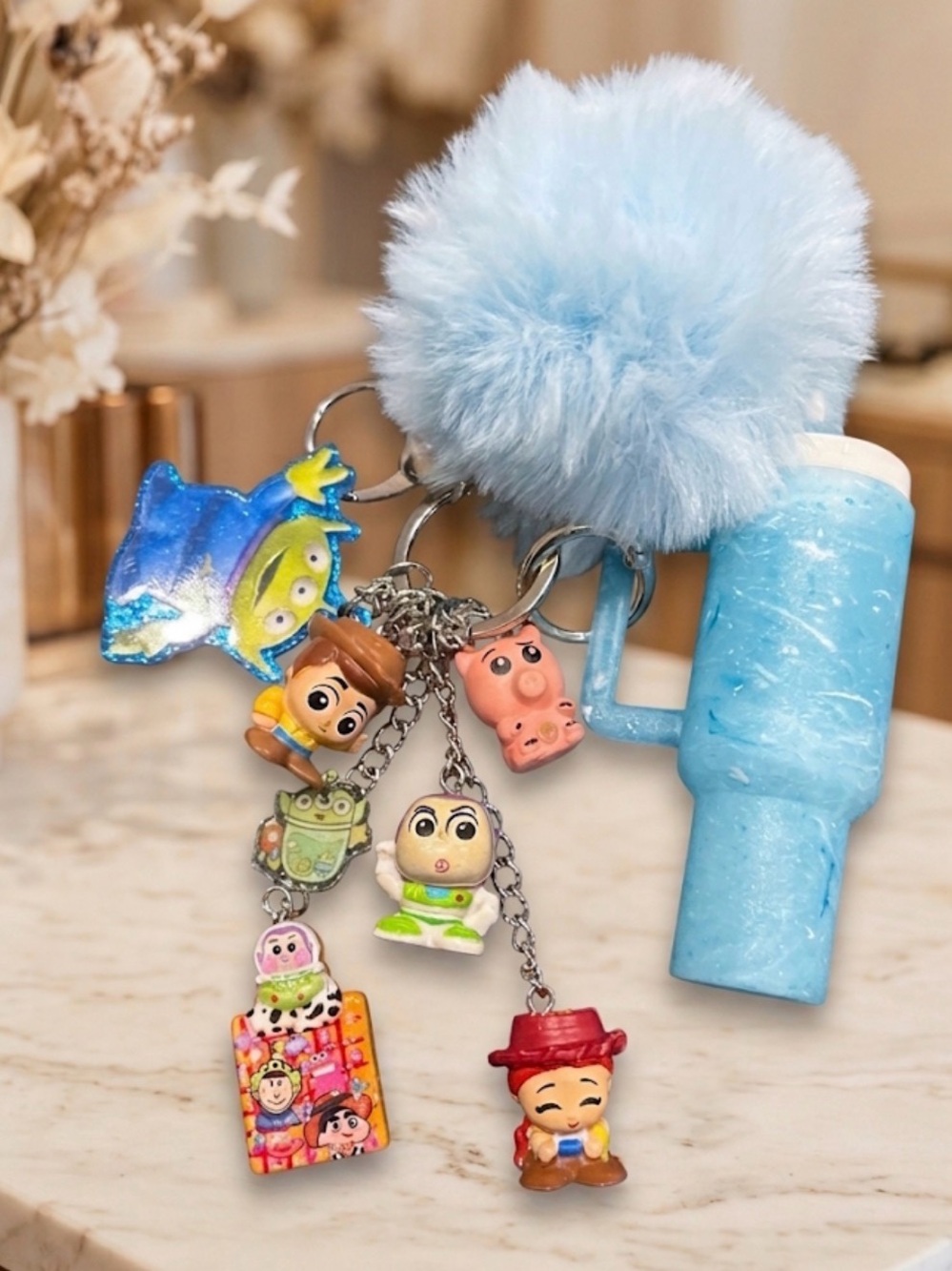 Custom  Blue Plush Pom Keychain with Toy Story Charms